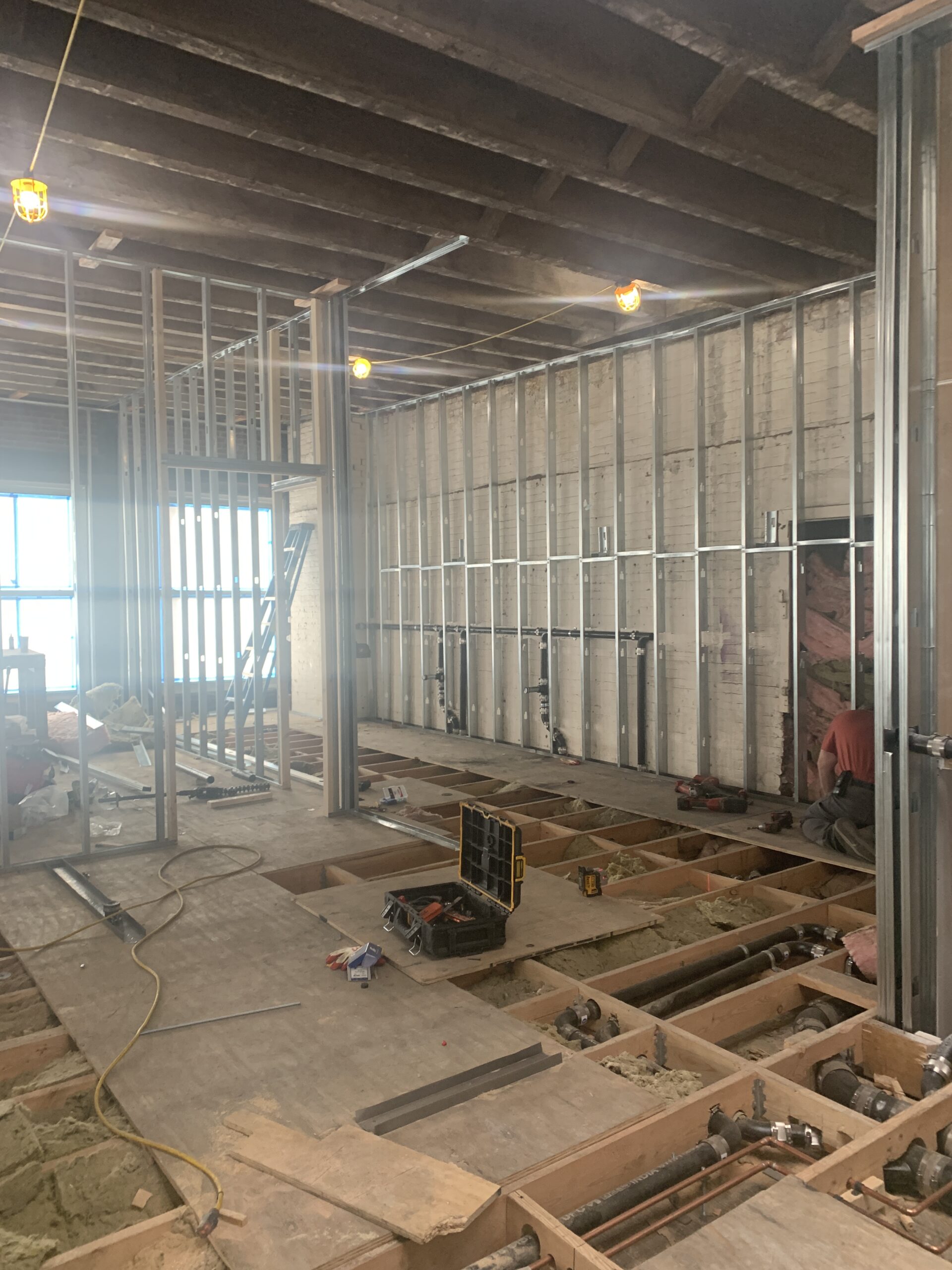 construction photo of metal framing and flooring